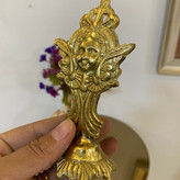مجسمه دکوری برنجی مدل استند رخ هندی مدرن و لوکس با خطوط انتزاعی صورت سوار بر پایه دکوراتیو با صقلکاری زرین متالوکس