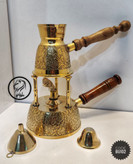 پایه وارمر برنجی گرد مدل خوابیده، طراحی مینیمال و مدرن برای گرم نگه داشتن چای در ظروف پذیرایی