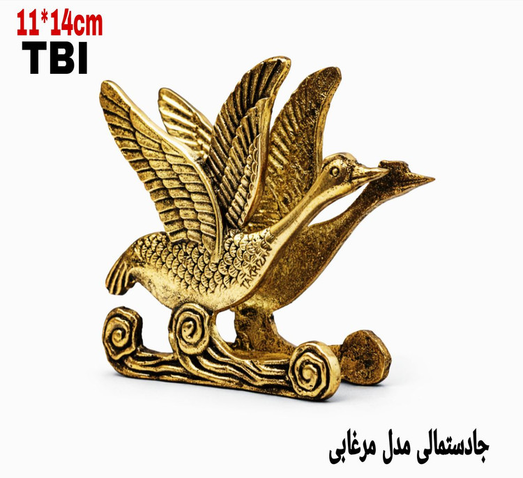 جادستمالی برنجی طرح دو مرغابی در حال پرواز با جزئیات دقیق پرها و حکاکیهای هنری روی پایه طلایی محصول متالوکس