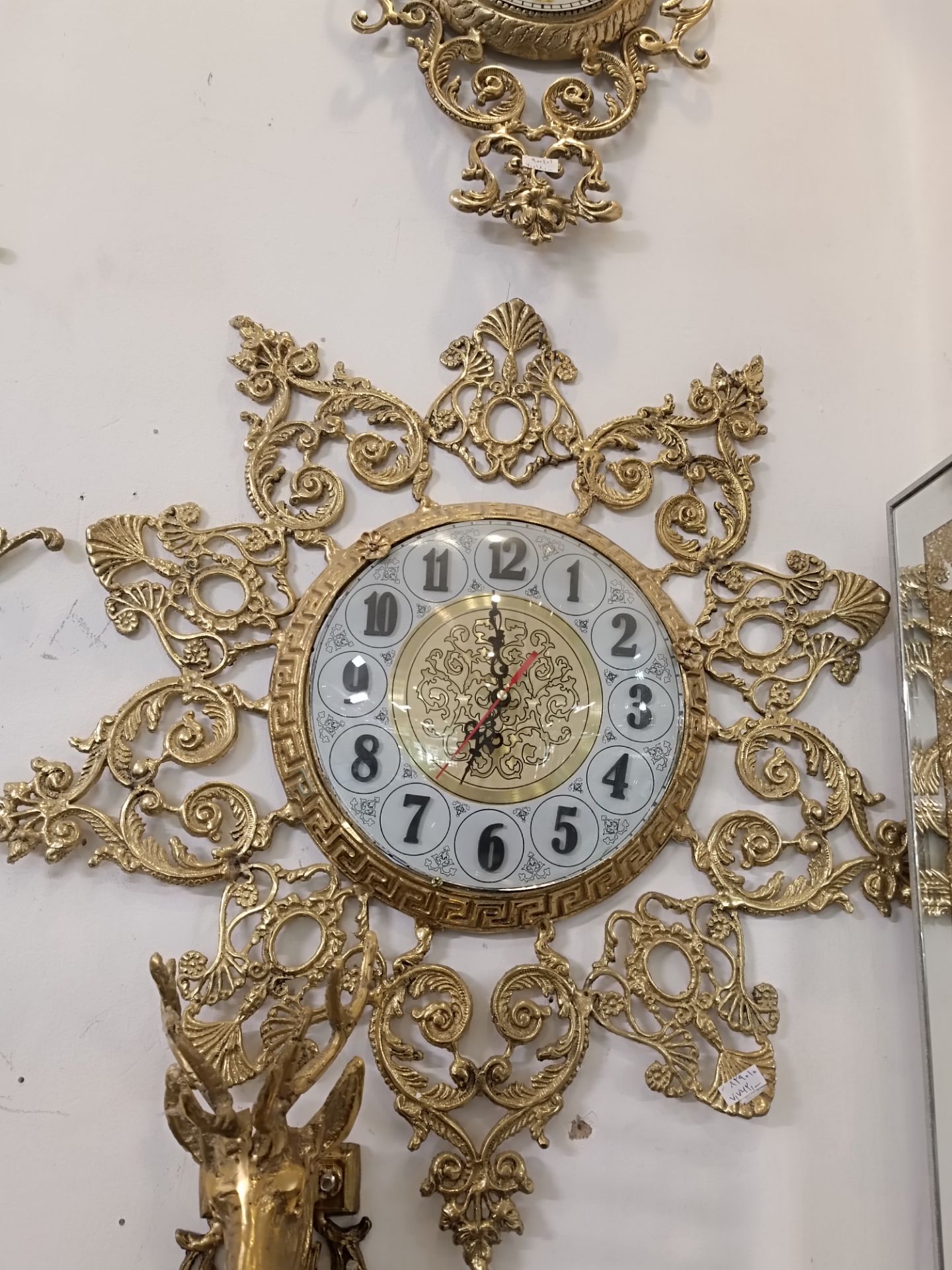 ساعت دیواری طلایی تمام برنجی مدل ده‌پر ساده با طراحی براق و آینه‌ای محصول اختصاصی متالوکس