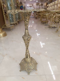 پایه دکوری برنجی طرح برگ با رنگ طلایی و طراحی ظریف مناسب زیر مجسمه یا شمعدان از متالوکس